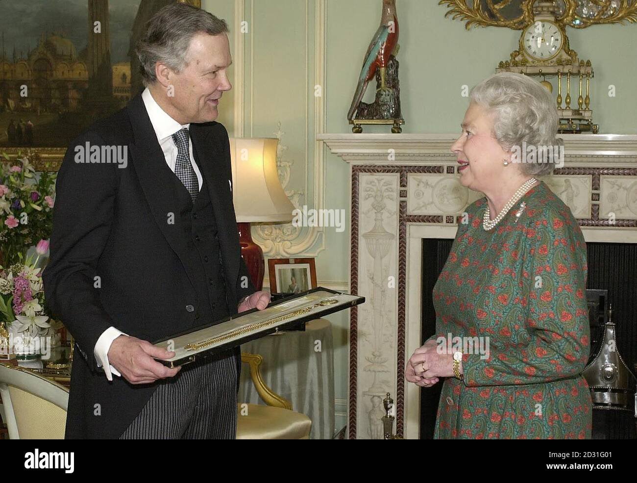 britains queen elizabeth ii receives sir anthony figgis on his appointment as marshal of the diplomatic corps at buckingham palace london 2d31g01